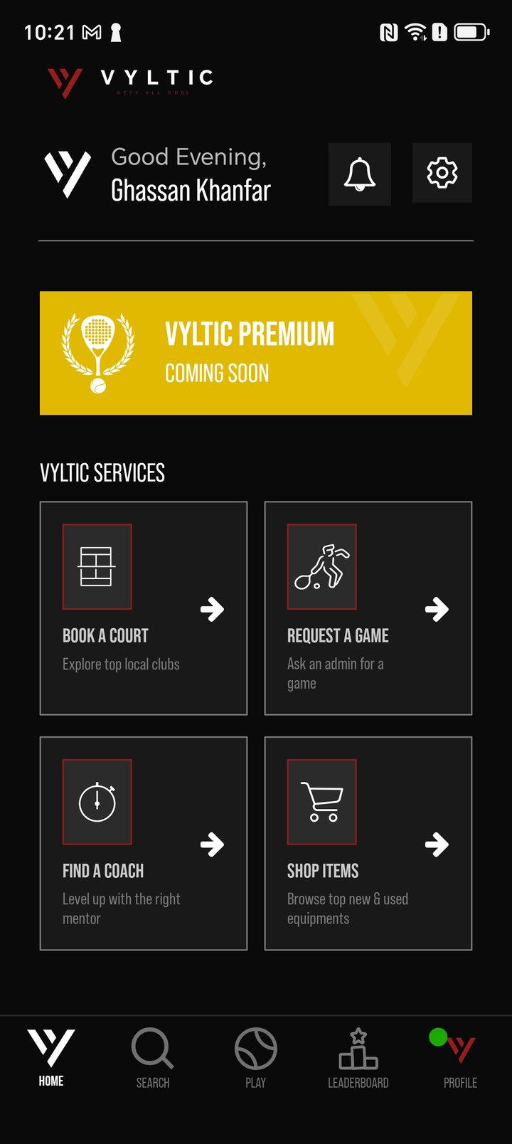 Old app home: a greeting, a premium coming-soon banner and four service tiles